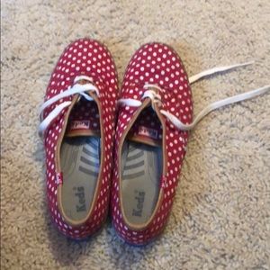 Red polka dot keds with navy blue trim